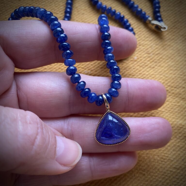 Sapphire bead and Tanzanite pendant